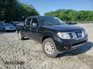 2014 Nissan Frontier SV with VIN 1N6AD0FV7EN736839, listed as a Copart auction lot 58390995 with 111,403 mi miles and Salvage title. Bid and sale history available at DreamBid. Image 13.