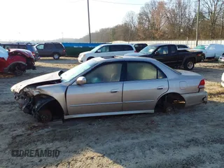 2002 Honda Accord EX z VIN 1HGCG16522A065397, wystawiony jako IAAI lot #41790485 z przebiegiem 223 389 mil mil oraz . Historia ofert i sprzedaży dostępna na DreamBid. Obrazek 14.