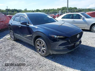 2022 Mazda CX-30 S Select with VIN 3MVDMBBL3NM412571, listed as a IAAI auction lot 42731325 with 35,303 mi miles and . Bid and sale history available at DreamBid. Image 1.
