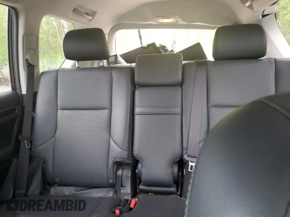 2014 Lexus GX 460 z VIN JTJBM7FX0E5070891, wystawiony jako Copart lot #56062055 z przebiegiem 130 323 mil mil oraz Szkoda całkowita • Salvage title. Historia ofert i sprzedaży dostępna na DreamBid. Obrazek 10.