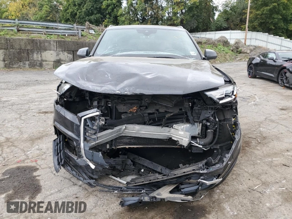 2021 Audi Q7 Premium with VIN WA1AJAF7XMD026559, listed as a Copart auction lot 74048224 with 59,648 mi miles and Salvage title. Bid and sale history available at DreamBid. Image 5.