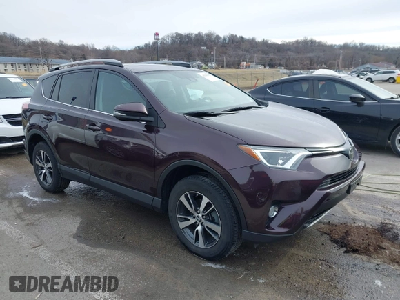 2018 Toyota RAV4 XLE with VIN 2T3RFREV6JW857693, listed as a IAAI auction lot 41541902 with 62,415 mi miles. Bid and sale history available at carsss.com. Image 1.