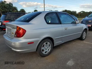 2004 Hyundai Accent GL with VIN KMHCG35C74U312579, listed as a Copart auction lot 75397884 with 0 mi miles and Salvage Title. Bid and sale history available at carsss.com. Image 3.
