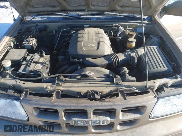 2002 Isuzu Rodeo with VIN 4S2DM58W824320291, listed as a IAAI auction lot 41385761 with 177,441 mi miles. Bid and sale history available at carsss.com. Image 10.