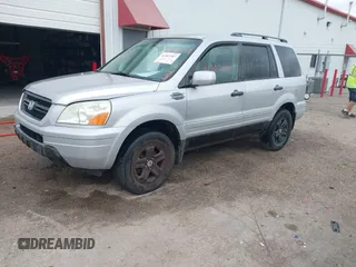 2003 Honda Pilot EX with VIN 2HKYF18523H501518, listed as a IAAI auction lot 41907387 with 234,473 mi miles and . Bid and sale history available at DreamBid. Image 2.