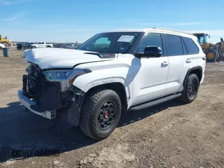 2023 Toyota Sequoia SR5 with VIN 7SVAAABA5PX015114, listed as a IAAI auction lot 41274936 with 39,091 mi miles. Bid and sale history available at carsss.com. Image 2.