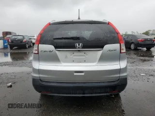 2013 Honda CR-V EX-L z VIN 2HKRM4H76DH634037, wystawiony jako Copart lot #57985265 z przebiegiem 80 399 mil mil oraz Szkody całkowita. Historia ofert i sprzedaży dostępna na DreamBid. Obrazek 6.