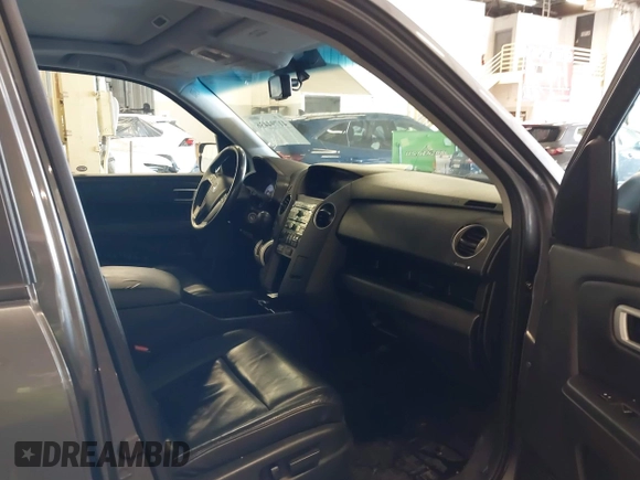 2011 Honda Pilot EX-L with VIN 5FNYF4H65BB020721, listed as a IAAI auction lot 41794436 with 113,630 mi miles and . Bid and sale history available at carsss.com. Image 5.