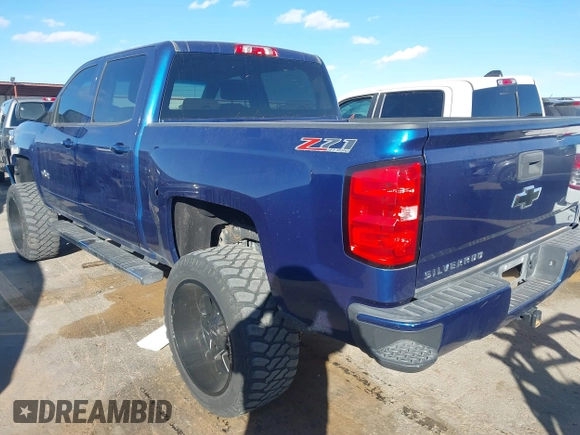 2017 Chevrolet Silverado 1500 LT with VIN 3GCUKREC8HG354004, listed as a IAAI auction lot 41429597 with 77,493 mi miles and . Bid and sale history available at DreamBid. Image 3.