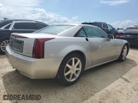 2006 Cadillac XLR z VIN 1G6YV36A365601441, wystawiony jako Copart lot #73945994 z przebiegiem Nie podano mil oraz Szkody całkowita. Historia ofert i sprzedaży dostępna na DreamBid. Obrazek 3.