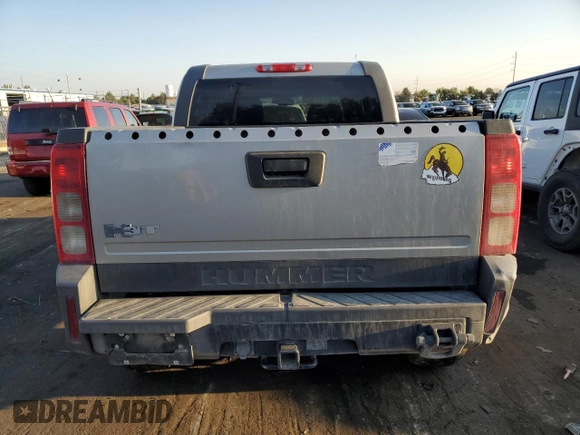 2009 Hummer H3 with VIN 5GNEN13E698128049, listed as a Copart auction lot 70453514 with 154,567 mi miles and Salvage Title. Bid and sale history available at DreamBid. Image 6.