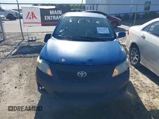 2009 Toyota Corolla with VIN 2T1BU40E69C166333, listed as a IAAI auction lot 42137539 with 127,564 mi miles. Bid and sale history available at carsss.com. Image 13.