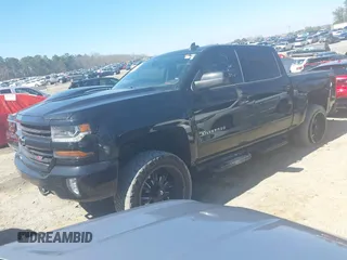2017 Chevrolet Silverado 1500 LT with VIN 3GCUKREC1HG358752, listed as a IAAI auction lot 41775110 with 150,528 mi miles and . Bid and sale history available at DreamBid. Image 2.