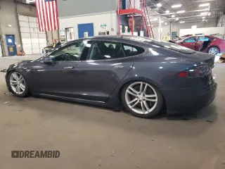 2014 Tesla Model S 60 with VIN 5YJSA1H14EFP53113, listed as a Copart auction lot 69430934 with 116,970 mi miles and Non repairable. Bid and sale history available at DreamBid. Image 2.