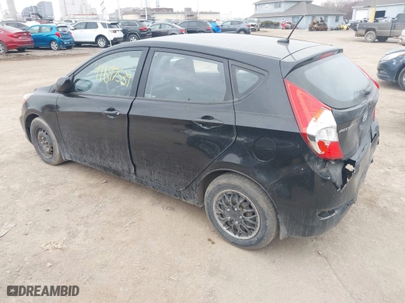 2014 Hyundai Accent GS with VIN KMHCT5AE6EU197814, listed as a IAAI auction lot 41697539 with 228,490 mi miles. Bid and sale history available at carsss.com. Image 3.
