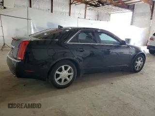 2009 Cadillac CTS AWD w/1SA with VIN 1G6DG577290158899, listed as a Copart auction lot 51449735 with 119,216 mi miles and Clean Title. Bid and sale history available at carsss.com. Image 3.