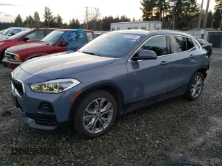 2021 BMW X2 xDrive28i with VIN WBXYJ1C04M5S24918, listed as a Copart auction lot 85152684 with 58,856 mi miles and Salvage Title. Bid and sale history available at carsss.com. Image 1.