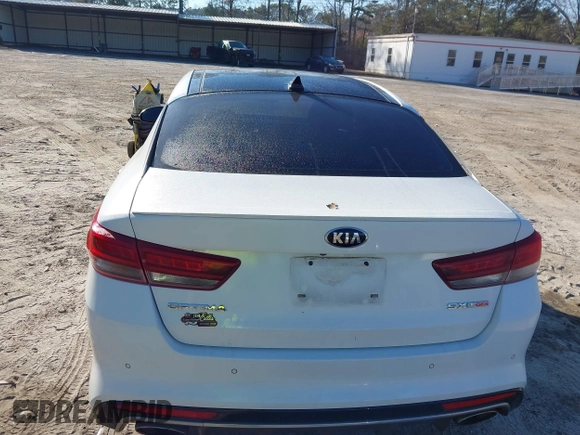 2016 Kia Optima SX Turbo with VIN 5XXGW4L2XGG084628, listed as a IAAI auction lot 41668592 with 116,535 mi miles and . Bid and sale history available at carsss.com. Image 16.
