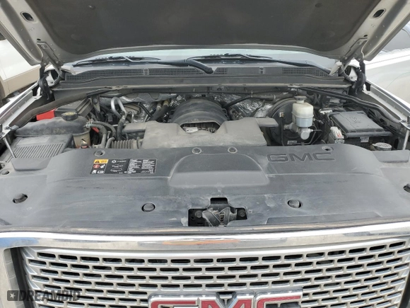 2016 GMC Yukon Denali with VIN 1GKS1CKJ2GR108935, listed as a Copart auction lot 45209655 with 143,421 mi miles and Salvage Title. Bid and sale history available at carsss.com. Image 12.