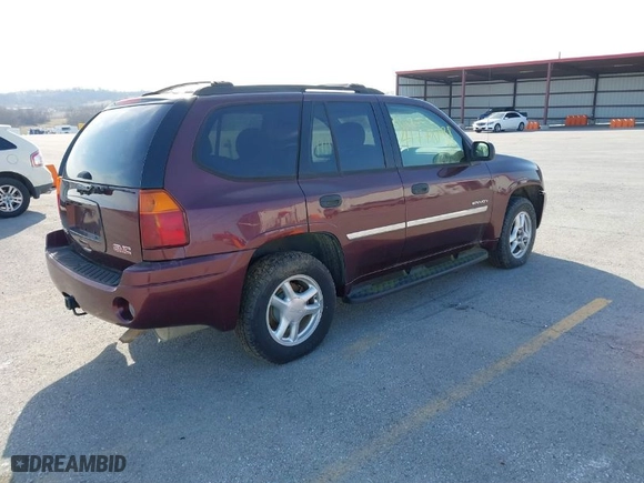 2006 GMC Envoy SLE with VIN 1GKDT13S762328884, listed as a IAAI auction lot 41778198 with 1 mi miles. Bid and sale history available at carsss.com. Image 4.