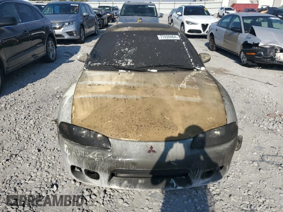 1998 Mitsubishi Eclipse GS-T with VIN 4A3AK54F8WE087052, listed as a Copart auction lot 77439464 with 119,881 mi miles and Salvage Title. Bid and sale history available at carsss.com. Image 5.