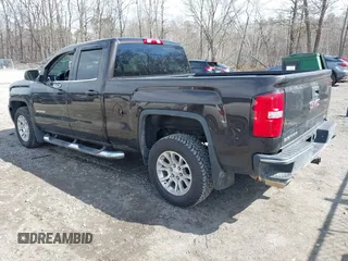 2018 GMC Sierra 1500 SLE z VIN 1GTV2MEC3JZ143967, wystawiony jako IAAI lot #41853850 z przebiegiem 80 205 mil mil oraz . Historia ofert i sprzedaży dostępna na DreamBid. Obrazek 3.
