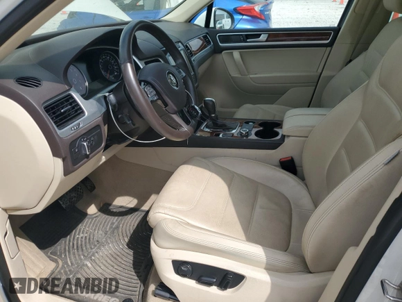2013 Volkswagen Touareg Lux with VIN WVGEF9BP9DD008658, listed as a Copart auction lot 52585925 with 93,369 mi miles and Salvage Title. Bid and sale history available at DreamBid. Image 7.