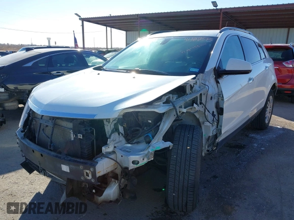 2015 Cadillac SRX with VIN 3GYFNAE34FS557297, listed as a IAAI auction lot 41388573 with 124,185 mi miles and . Bid and sale history available at DreamBid. Image 6.
