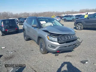 2020 Jeep Compass Trailhawk with VIN 3C4NJDDBXLT106663, listed as a IAAI auction lot 41791300 with 74,162 mi miles and . Bid and sale history available at carsss.com. Image 1.