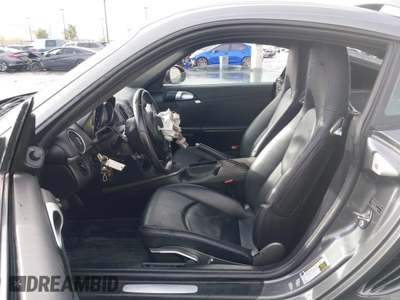 2012 Porsche 718 Cayman z VIN WP0AA2A88CS760106, wystawiony jako IAAI lot #41921806 z przebiegiem 120 501 mil mil oraz . Historia ofert i sprzedaży dostępna na DreamBid. Obrazek 5.
