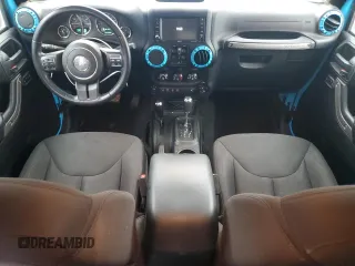 2018 Jeep Wrangler JK Unlimited Sport S with VIN 1C4BJWDG1JL868623, listed as a Copart auction lot 71317144 with 64,126 mi miles and Salvage Title. Bid and sale history available at carsss.com. Image 8.