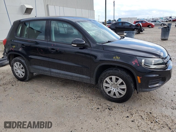 2014 Volkswagen Tiguan with VIN WVGCV3AX4EW526613, listed as a Copart auction lot 73949784 with 83,421 mi miles and Salvage Title. Bid and sale history available at DreamBid. Image 4.