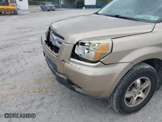 2006 Honda Pilot EX-L with VIN 5FNYF28566B010295, listed as a IAAI auction lot 41654433 with 302,539 mi miles. Bid and sale history available at carsss.com. Image 6.