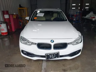 2018 BMW 3 Series 320i xDrive with VIN WBA8E5G56JNU47338, listed as a IAAI auction lot 41238204 with 54,596 mi miles. Bid and sale history available at carsss.com. Image 12.