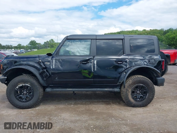 2024 Ford Bronco Wildtrak with VIN 1FMEE2BP1RLA75293, listed as a IAAI auction lot 42199529 with 6,466 mi miles and . Bid and sale history available at DreamBid. Image 14.