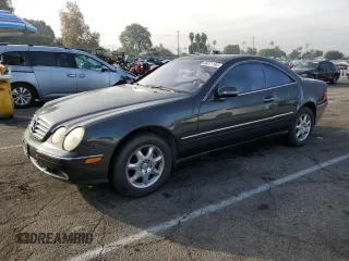 2000 Mercedes-Benz CL-Class with VIN WDBPJ75JXYA004325, listed as a Copart auction lot 86611184 with 148,006 mi miles and Salvage Title. Bid and sale history available at carsss.com. Image 1.