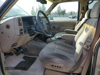 1999 GMC Suburban with VIN 3GKEC16R0XG526194, listed as a Copart auction lot 83740634 with 199,583 mi miles and Clean title. Bid and sale history available at DreamBid. Image 7.