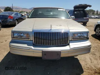 1997 Lincoln Town Car Executive with VIN 1LNLM81W8VY734974, listed as a Copart auction lot 61440195 with 94,982 mi miles and Clean title. Bid and sale history available at DreamBid. Image 5.