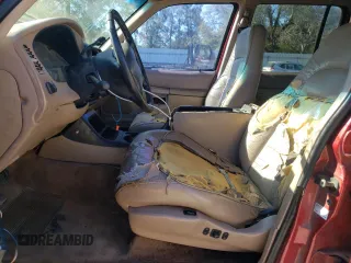 1997 Ford Explorer XL with VIN 1FMDU32E8VZC21604, listed as a Copart auction lot 81987654 with 156,141 mi miles and Salvage title. Bid and sale history available at DreamBid. Image 7.