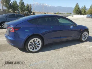 2023 Tesla Model 3 Long Range with VIN 5YJ3E1EB3PF633070, listed as a Copart auction lot 48942545 with 38,332 mi miles and Salvage Title. Bid and sale history available at DreamBid. Image 3.