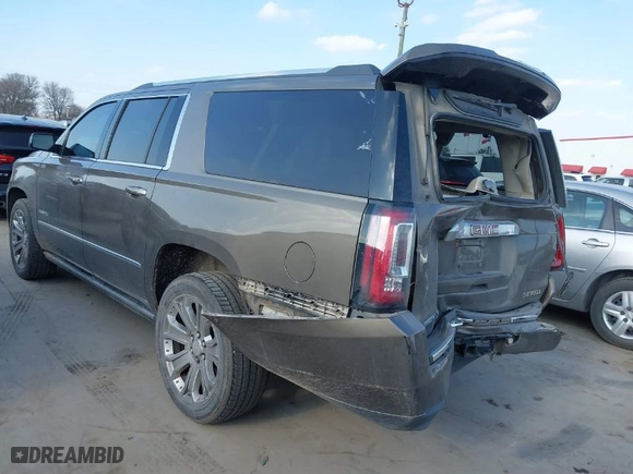 2015 GMC Yukon XL Denali with VIN 1GKS1JKJ2FR737663, listed as a IAAI auction lot 41524746 with 120,788 mi miles. Bid and sale history available at carsss.com. Image 3.