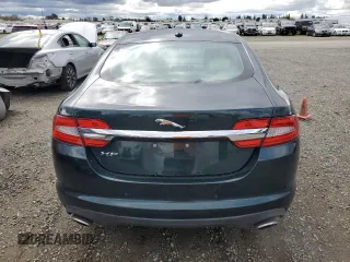 2012 Jaguar XF Portfolio with VIN SAJWA0HB4CLS49225, listed as a Copart auction lot 48070445 with 61,059 mi miles and Salvage Title. Bid and sale history available at carsss.com. Image 6.