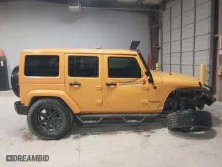 2012 Jeep Wrangler Unlimited Sahara with VIN 1C4HJWEG0CL173304, listed as a IAAI auction lot 41853457 with 278,324 mi miles. Bid and sale history available at carsss.com. Image 13.
