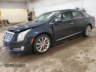 2013 Cadillac XTS Premium z VIN 2G61S5S32D9145798, wystawiony jako Copart lot #79741944 z przebiegiem 152 481 mil mil oraz Tytuł czysty. Historia ofert i sprzedaży dostępna na DreamBid. Obrazek 1.