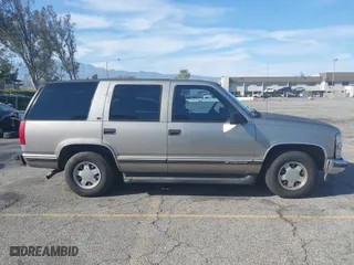 1999 Chevrolet Tahoe with VIN 1GNEC13R8XJ527499, listed as a IAAI auction lot 41880157 with 186,342 mi miles. Bid and sale history available at carsss.com. Image 13.