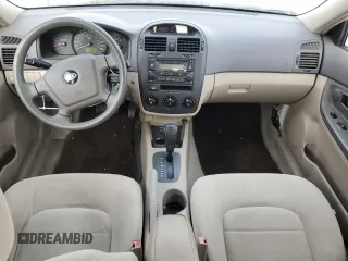 2006 Kia Spectra EX with VIN KNAFE121265208526, listed as a Copart auction lot 80300604 with 101,780 mi miles and Salvage Title. Bid and sale history available at carsss.com. Image 8.