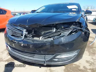 2015 Lincoln MKZ with VIN 3LN6L2G93FR619701, listed as a IAAI auction lot 41794410 with 77,201 mi miles. Bid and sale history available at carsss.com. Image 6.