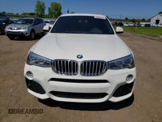 2015 BMW X4 xDrive28i with VIN 5UXXW3C53F0F89089, listed as a Copart auction lot 65869723 with 79,072 mi miles. Bid and sale history available at carsss.com. Image 5.
