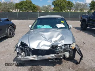 2002 Honda Accord LX z VIN JHMCG56462C005400, wystawiony jako IAAI lot #41893400 z przebiegiem Nie podano mil oraz . Historia ofert i sprzedaży dostępna na DreamBid. Obrazek 13.