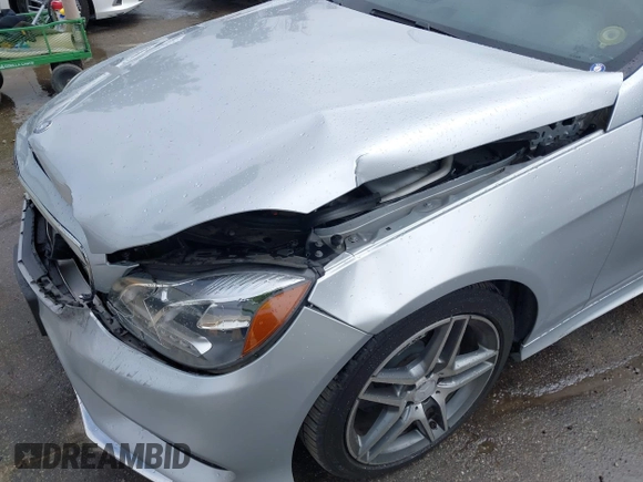 2014 Mercedes-Benz E E 350 Sport with VIN WDDHF5KB8EB009303, listed as a IAAI auction lot 42014846 with 97,214 mi miles. Bid and sale history available at carsss.com. Image 6.